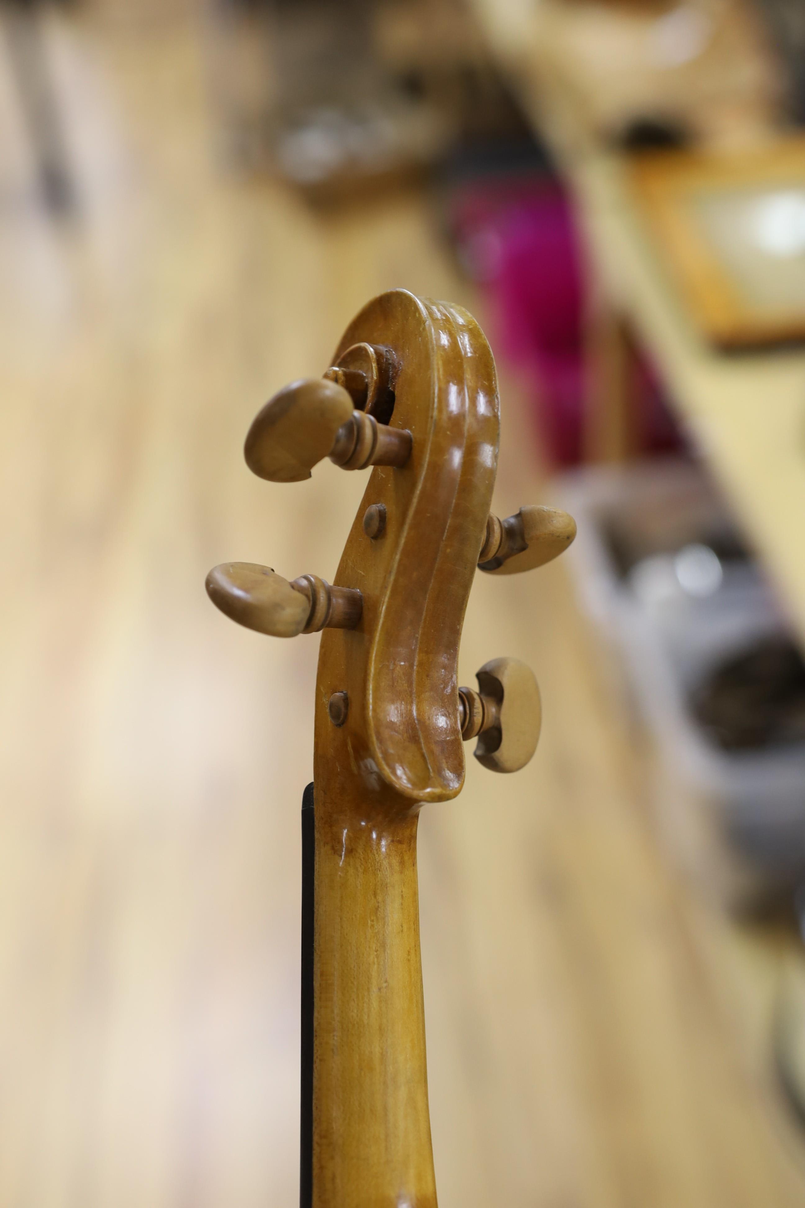 A cased student's violin, length of back 33 cm